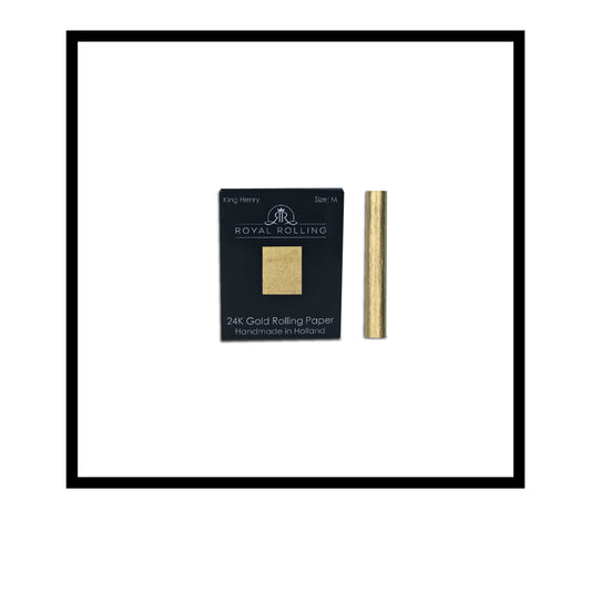 Royal Rolling Cone M made of 24-karat gold in a black-and-white Packaging, glass tube with twist cap. Handmade in Holland (Amsterdam, Alkmaar, Rotterdam, North Holland). Luxury gift with custom packaging. Available in Pure Gold Deluxe Size M, 70mm, Rolling paper in packaging