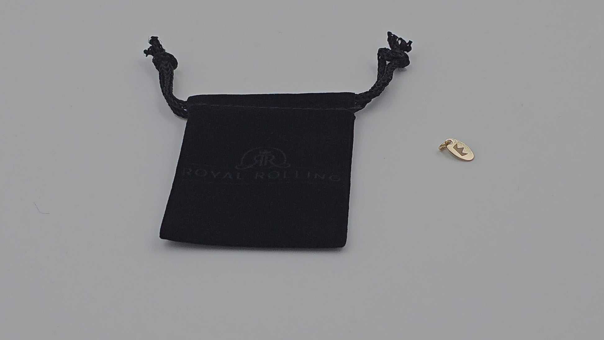 Royal Rolling black velvet pouch with Gold-filled talisman video 